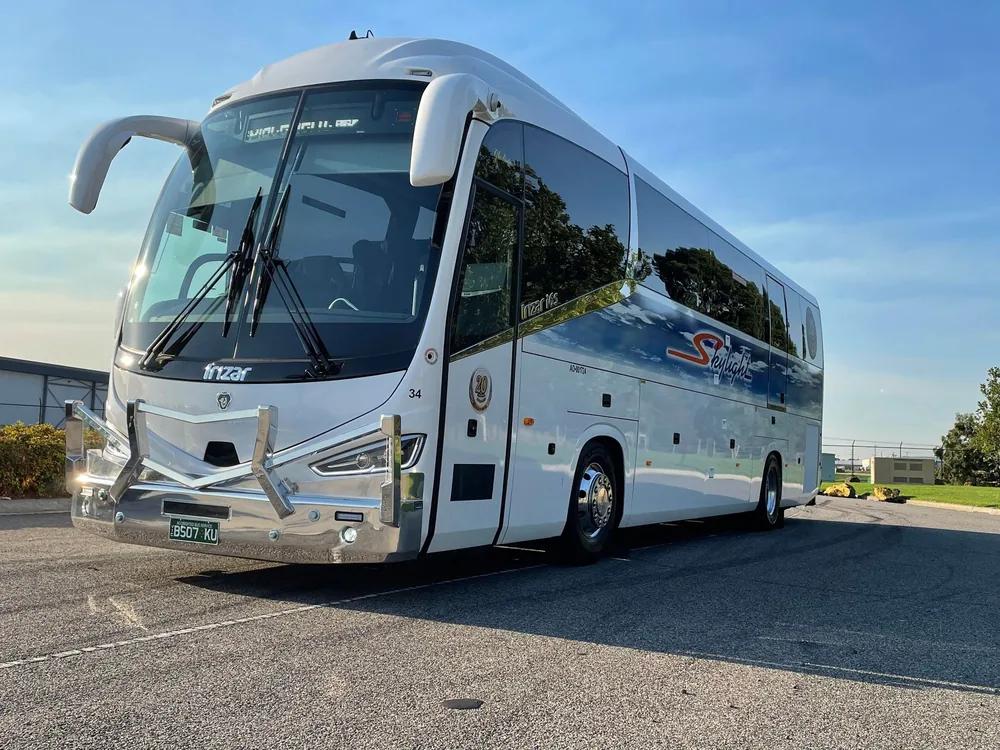 A Skylight Buslines coach in its sky-and-cloud livery at the Campbellfield depot, Melbourne